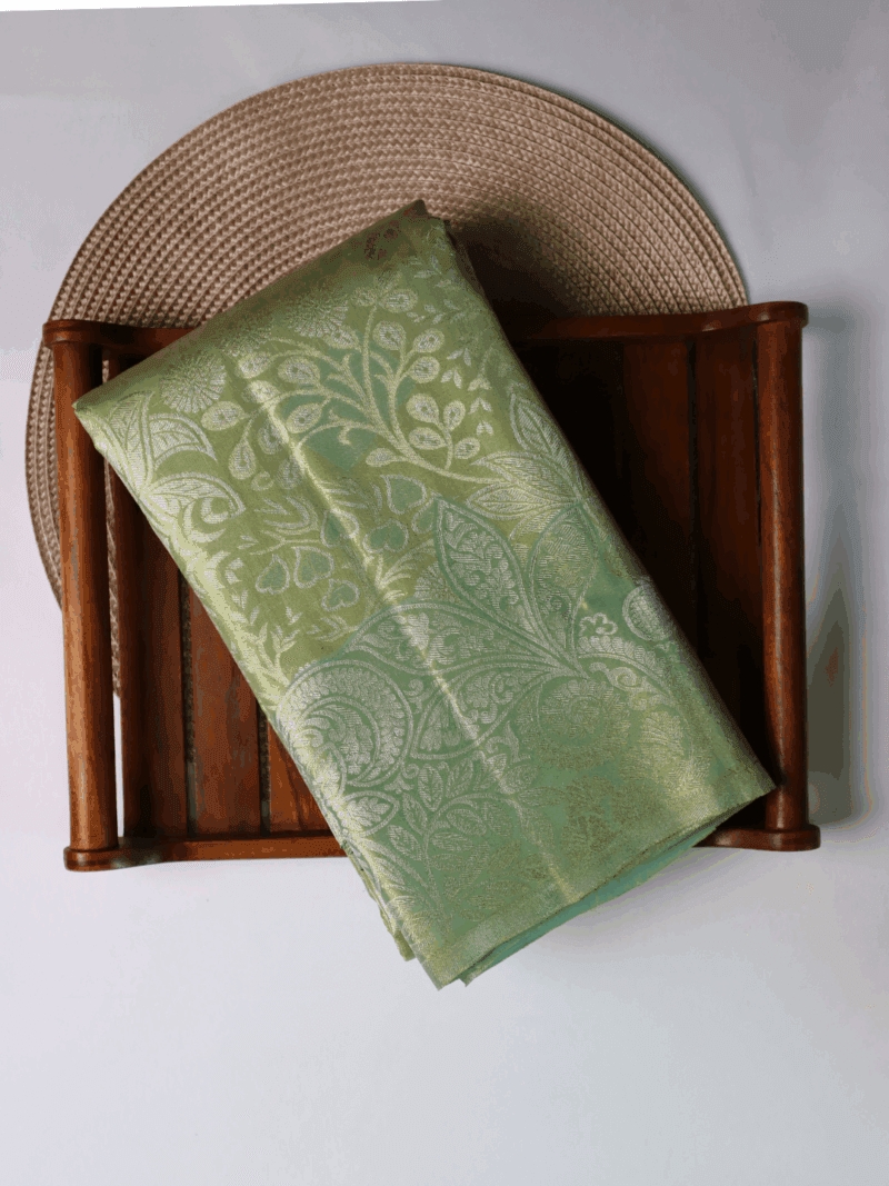 Kanjeevaram Silk Saree – Light Green with Silver Zari Floral Pallu – Handwoven Traditional Wedding Saree
